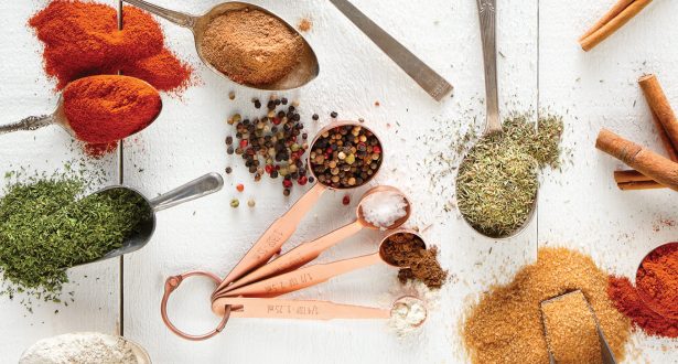 spoons filled with spices