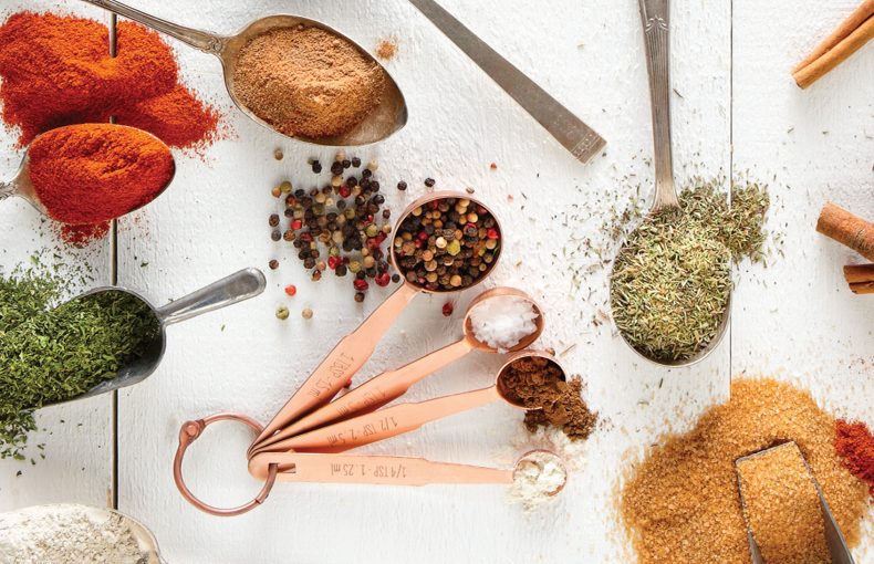 spoons filled with spices