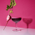glass with beet against it
