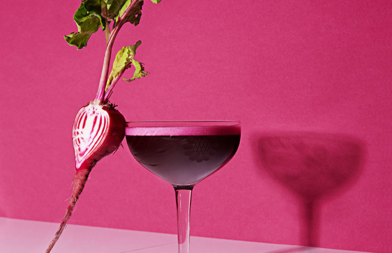 glass with beet against it