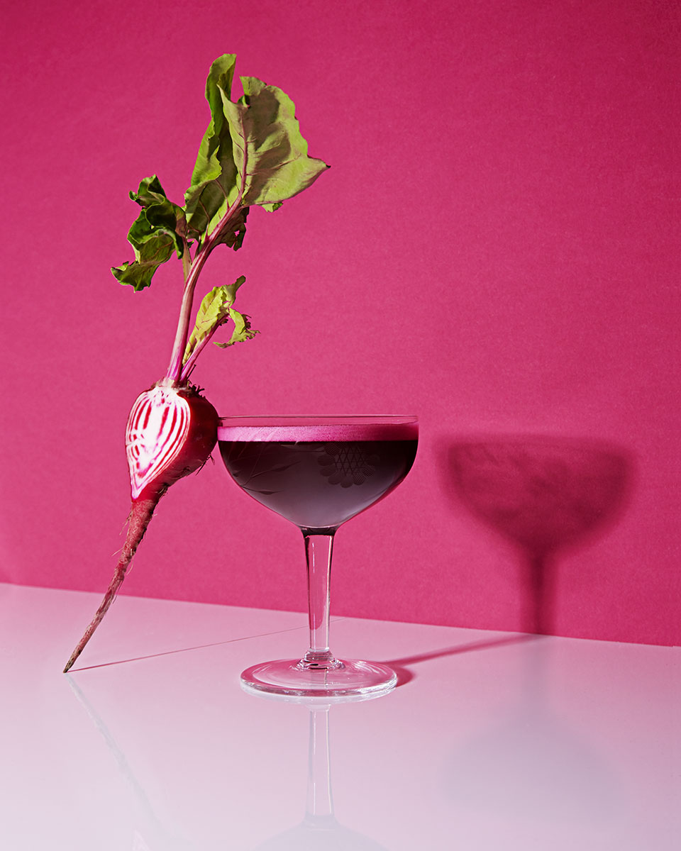 glass with beet against it