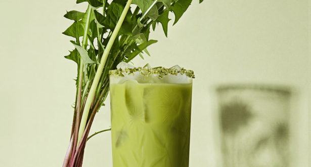 glass with garnish against it