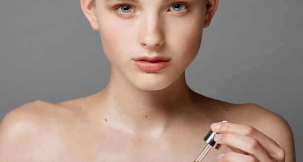 girl with face serum