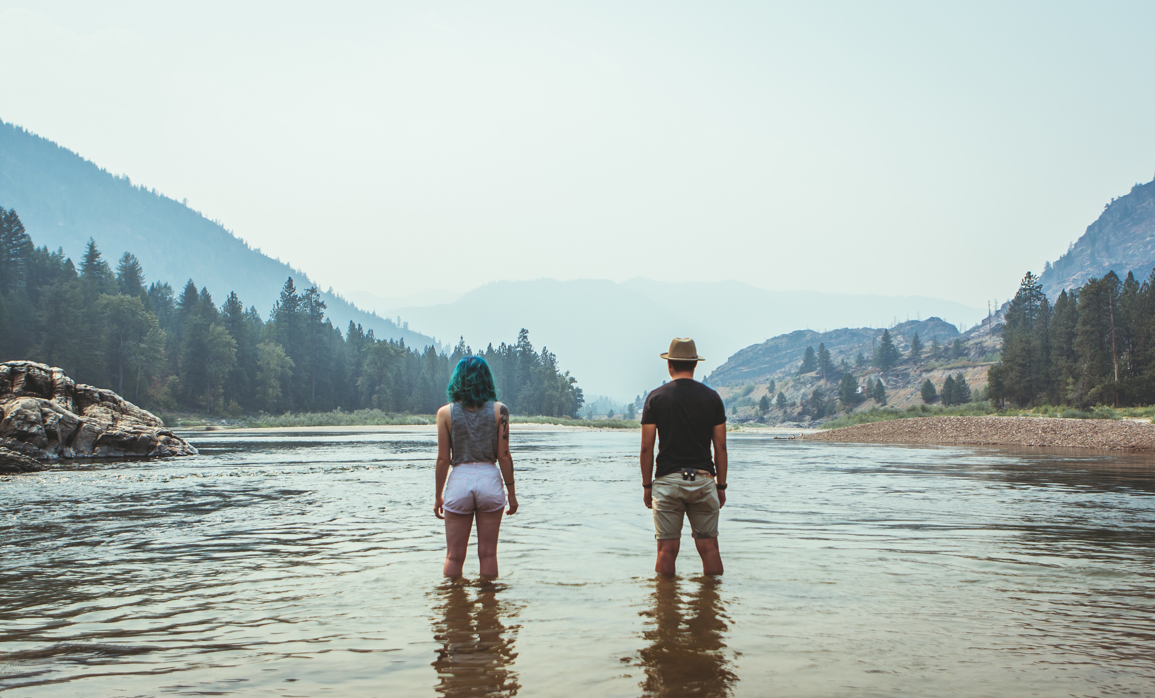 couple standing in lake